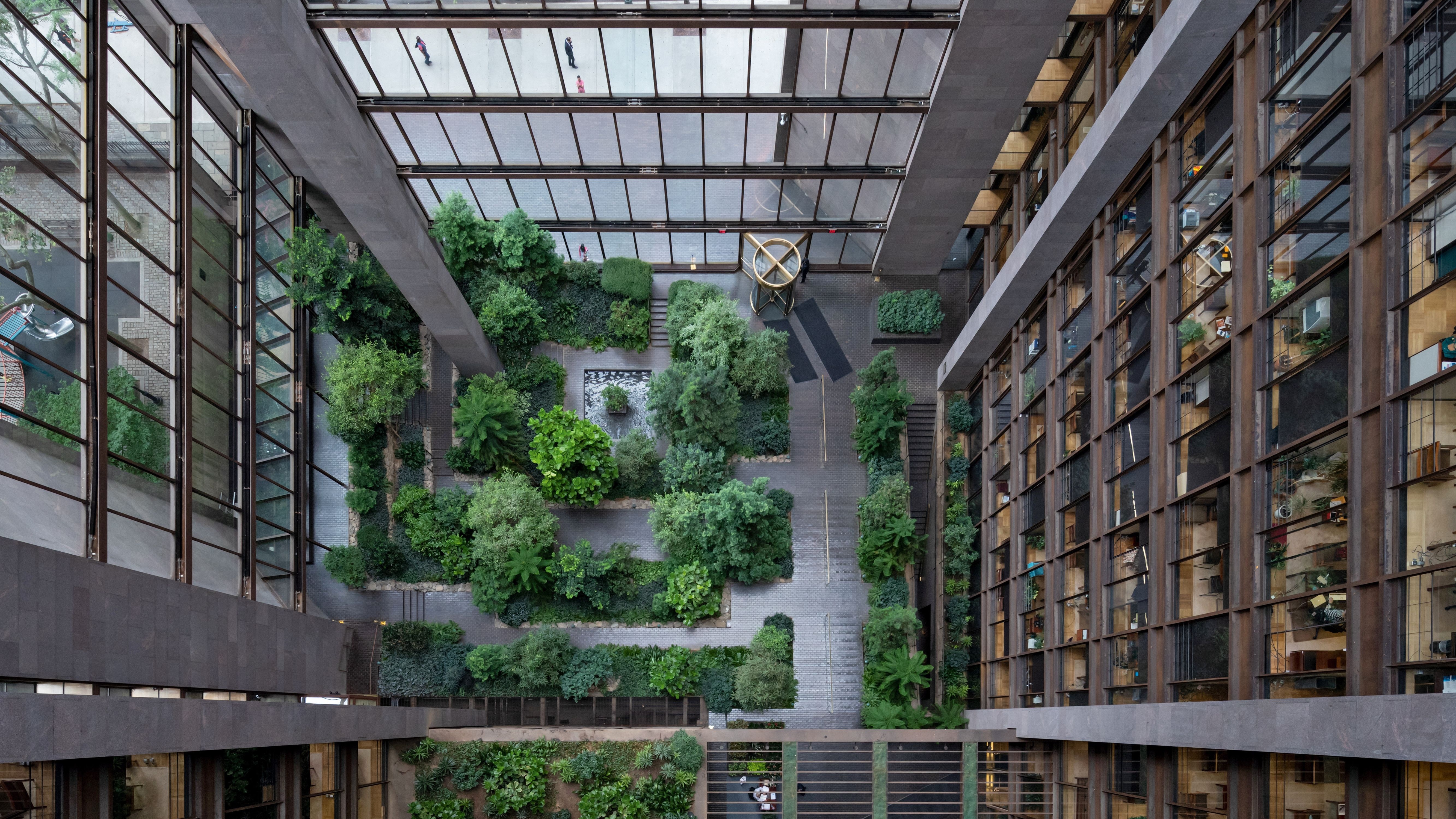 Modern open office workspace with architectural elements